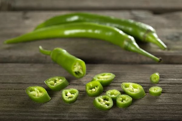 Which Country Exports the Most Green Chilies and Peppers in the World?